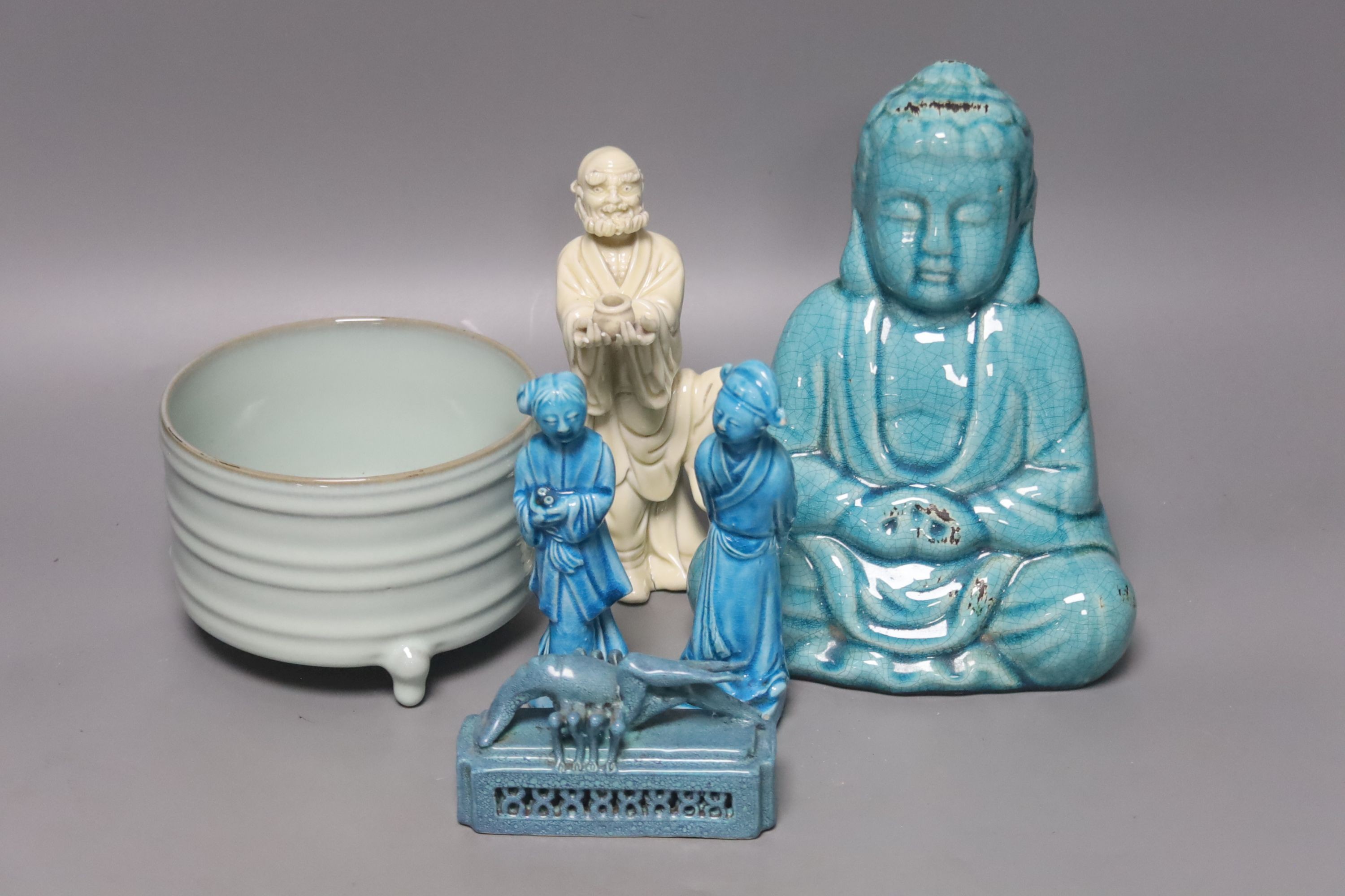 A Chinese turquoise glazed Buddha, height 21cm, a pair of figurines, a robin’s egg glazed model of a lobster, and a tripod censer